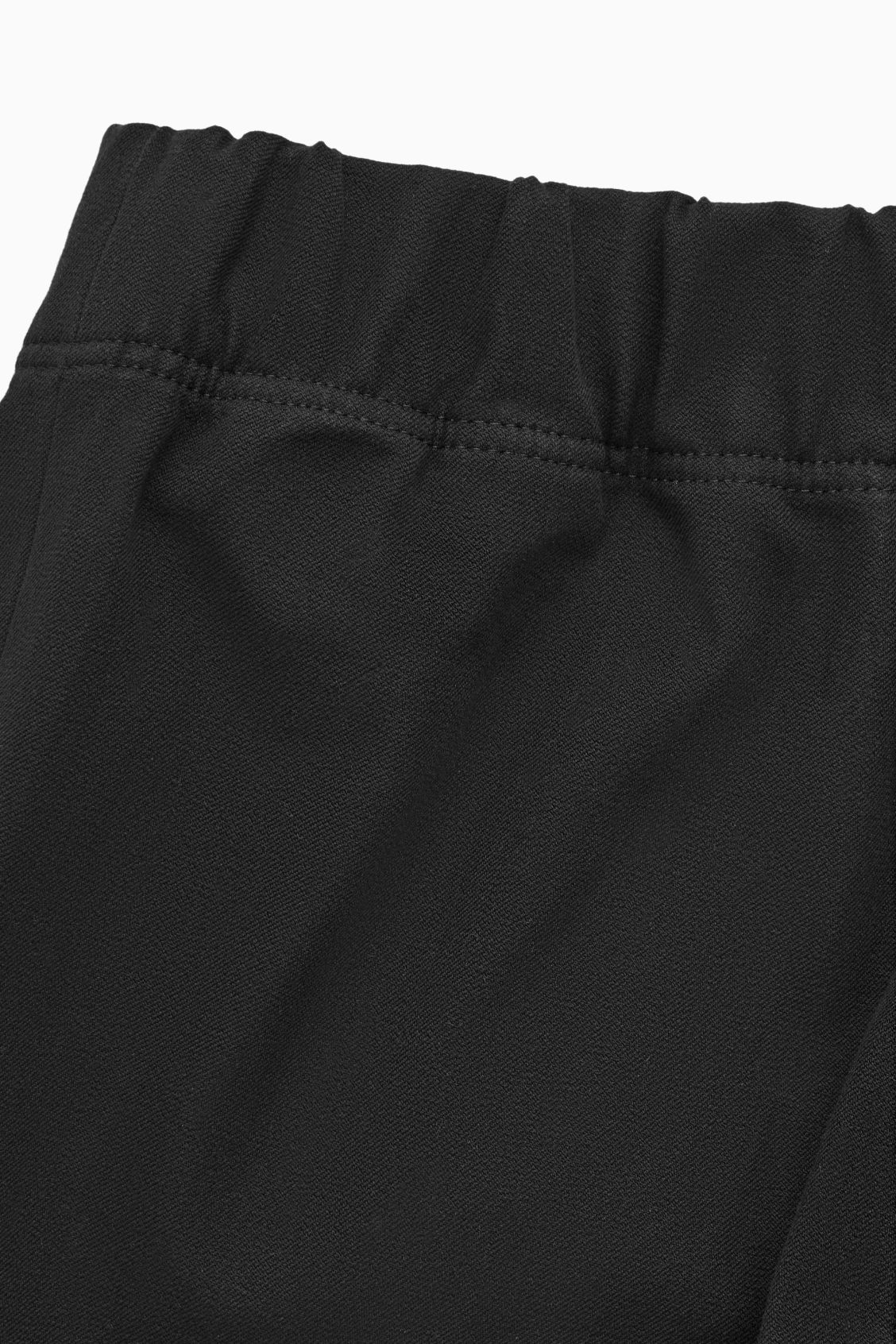 Buy COS Slim-Fit Zip Hem Trousers Online